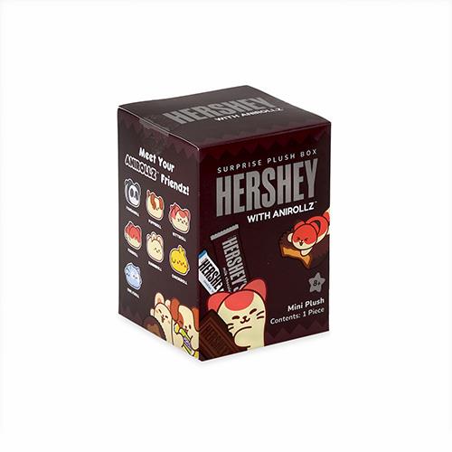 Close-up of a Hershey's with Anirollz surprise plush box, featuring cartoon animals resembling the plush toys inside.