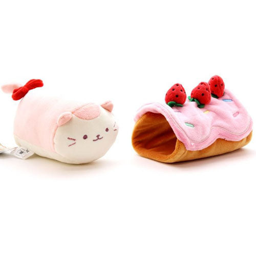 Two plush cat toys on a white background. One is pink and cream with a red bow, the other is shaped like a strawberry frosted donut.