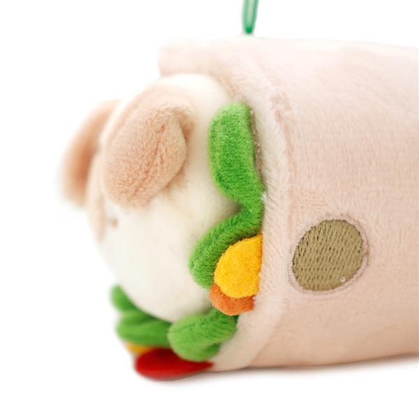 Stuffed toy of a white rabbit in a pink taco.