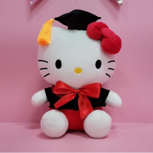 Hello Kitty plush in graduation attire with black cap, red bow, and red robe.