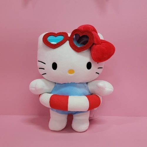 Hello Kitty plush toy wearing heart sunglasses and a red and white striped swim ring.