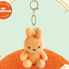 Orange stuffed bunny keychain.