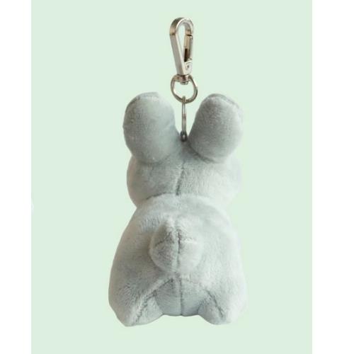 Back of a gray, plush rabbit keychain.