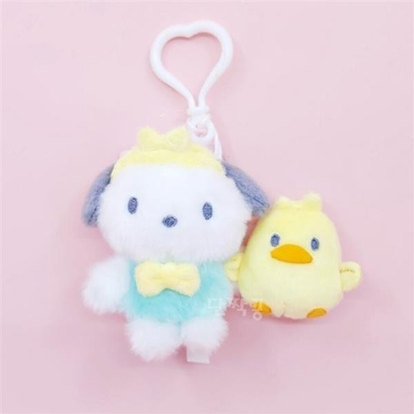 Plush keychain featuring a white dog with a yellow crown and bow tie next to a yellow chick.