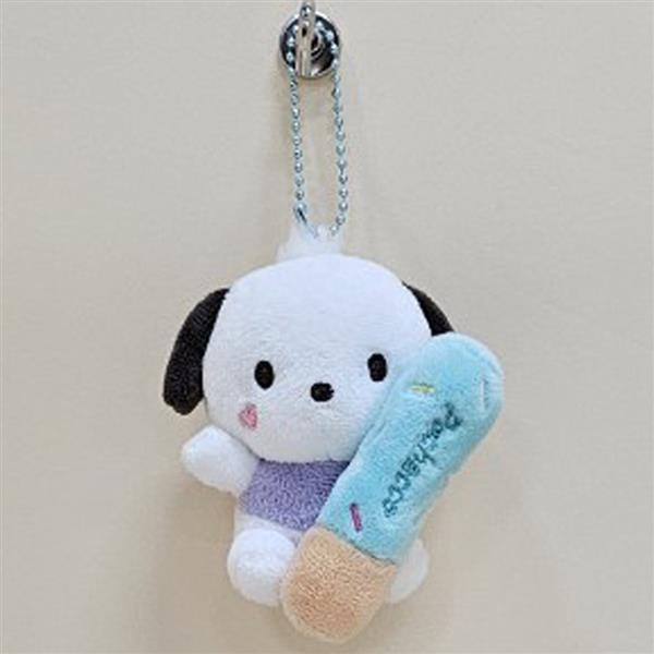 A Sanrio Pochacco plush keychain with a light blue ice cream cone.