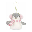 Stuffed penguin with pink earmuffs and pink and white striped scarf.