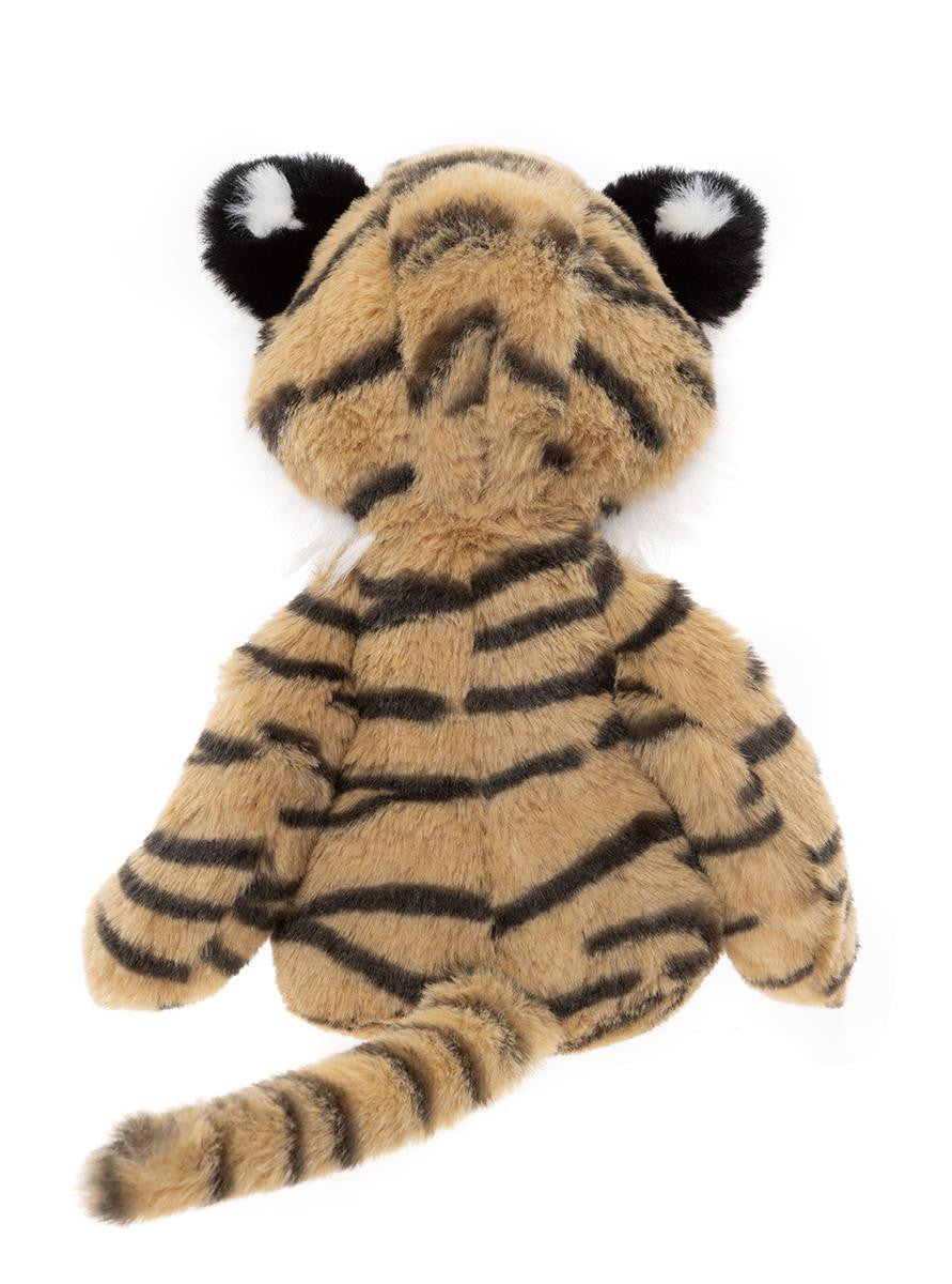 Plush tiger toy on a white background