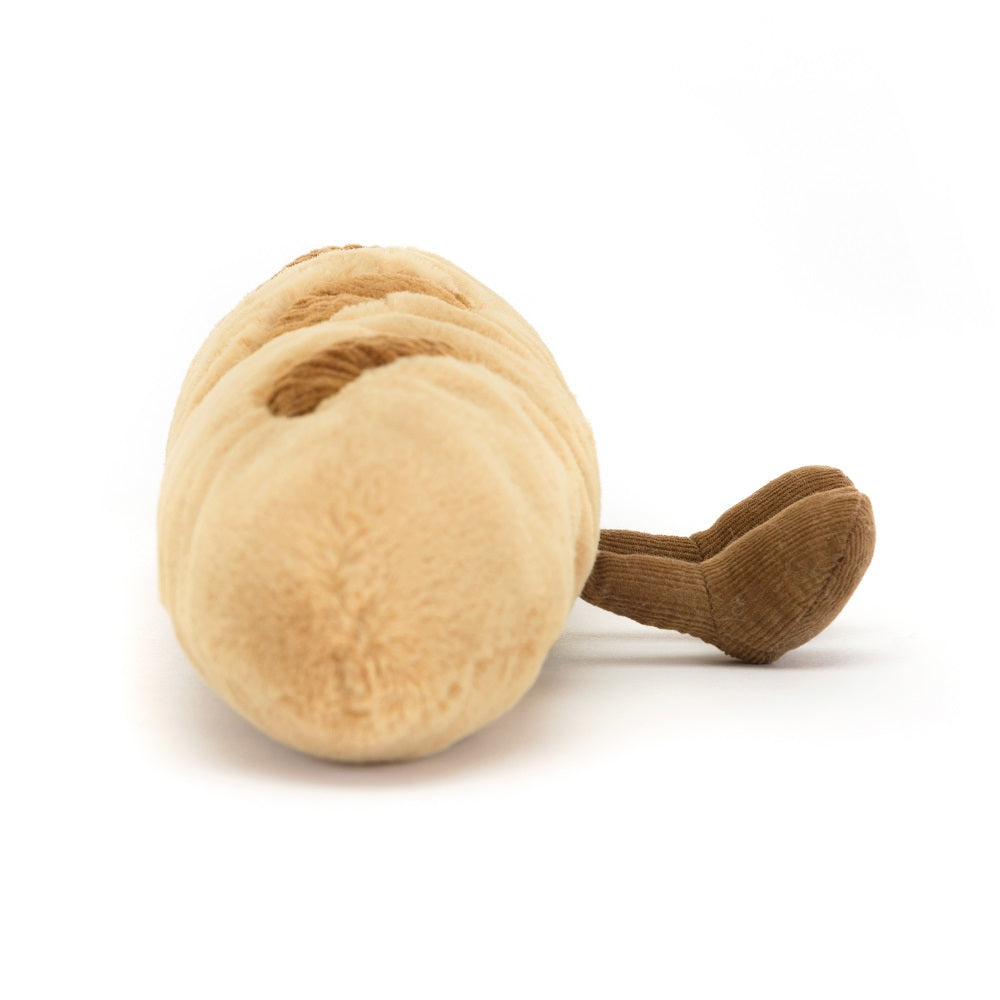 Tan plush toy with brown stripes and brown corduroy feet.