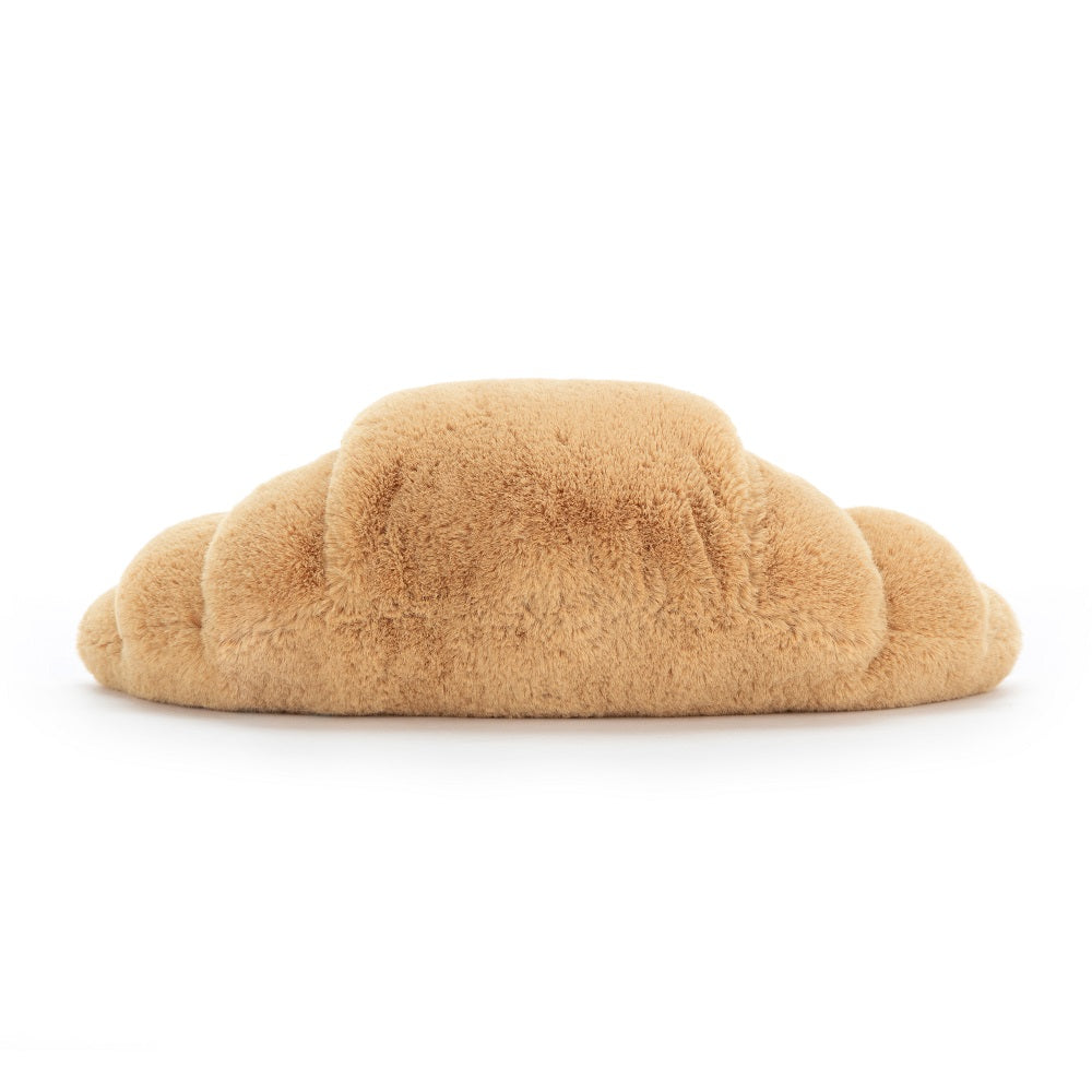 Fuzzy croissant plush toy.