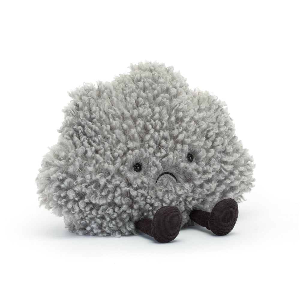 Gray, plush cloud toy with sad face.