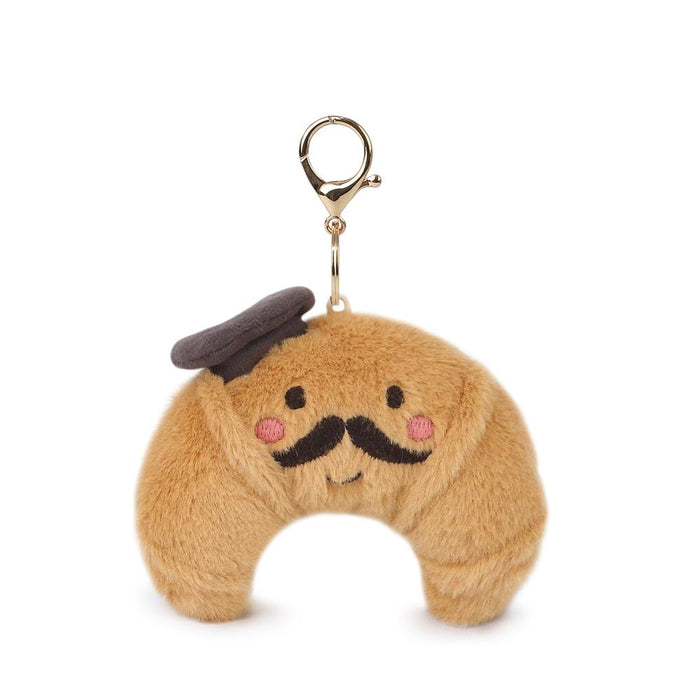 Plush keychain with a mustache and top hat on a white background