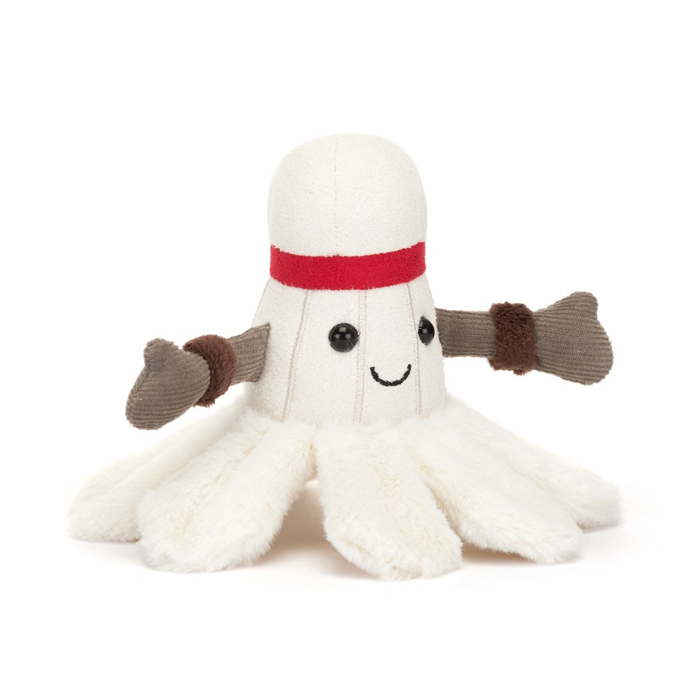 Stuffed shuttlecock toy with a smiling face and outstretched arms.