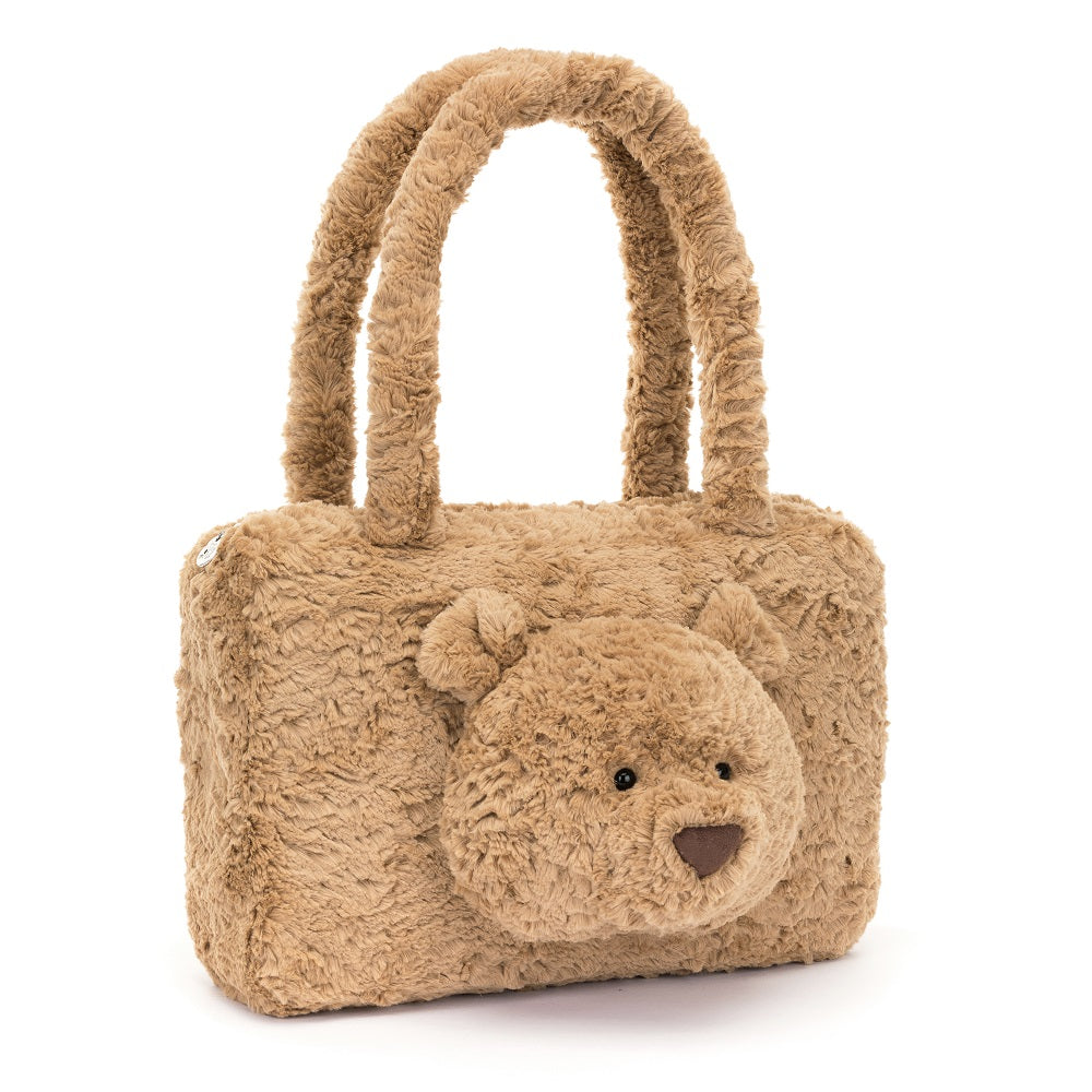A plush teddy bear-shaped tote bag.