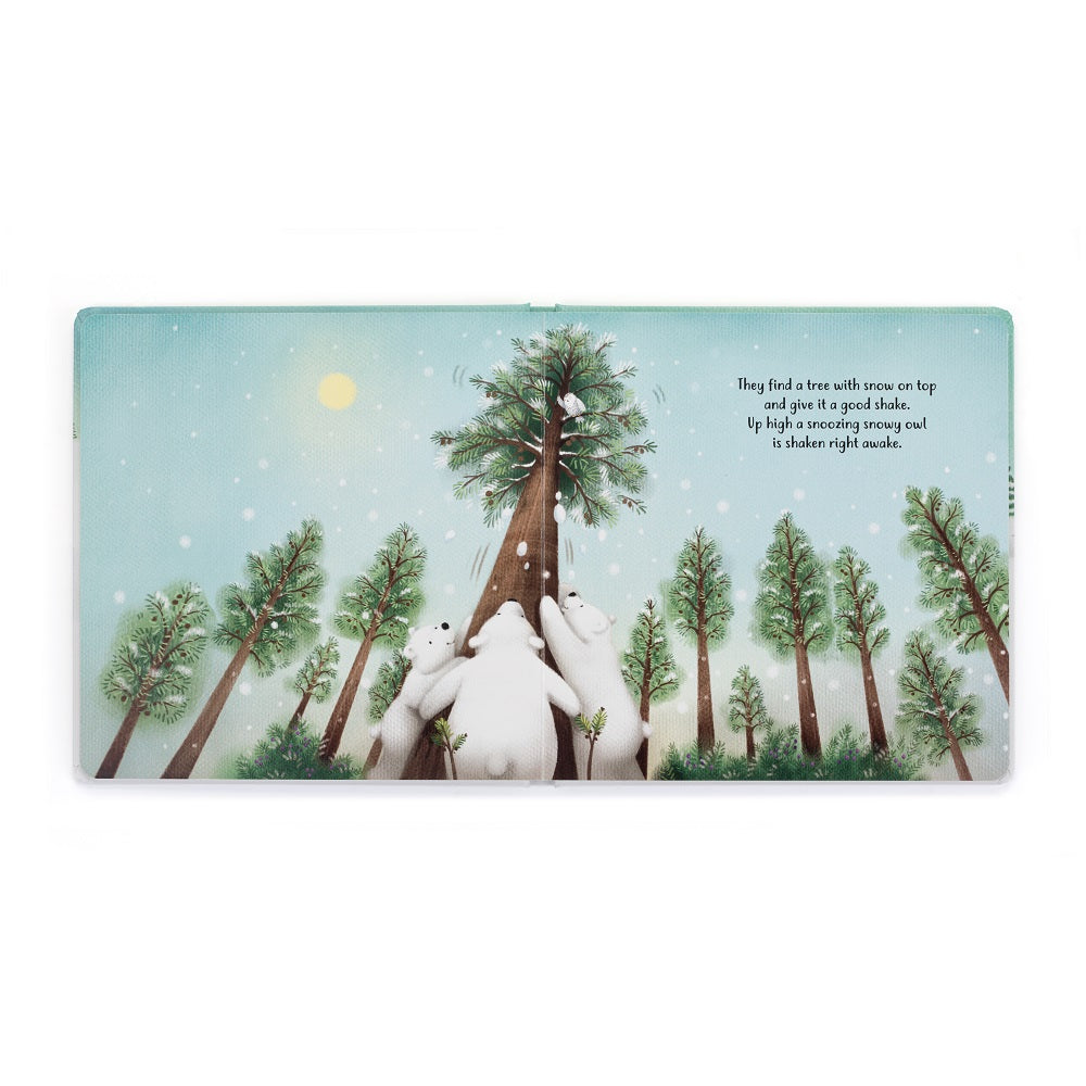 A storybook page with illustrations of polar bears shaking a tree.