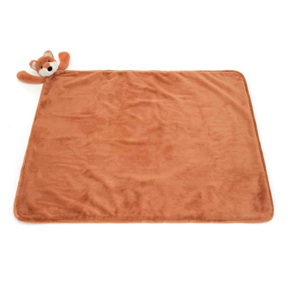 Orange plush blanket with a fox stuffed animal attached.