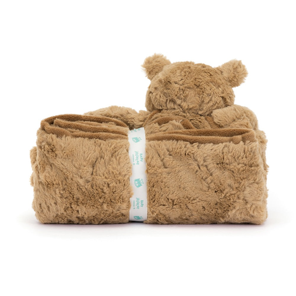 Rolled-up, brown, furry baby blanket with a bear head.