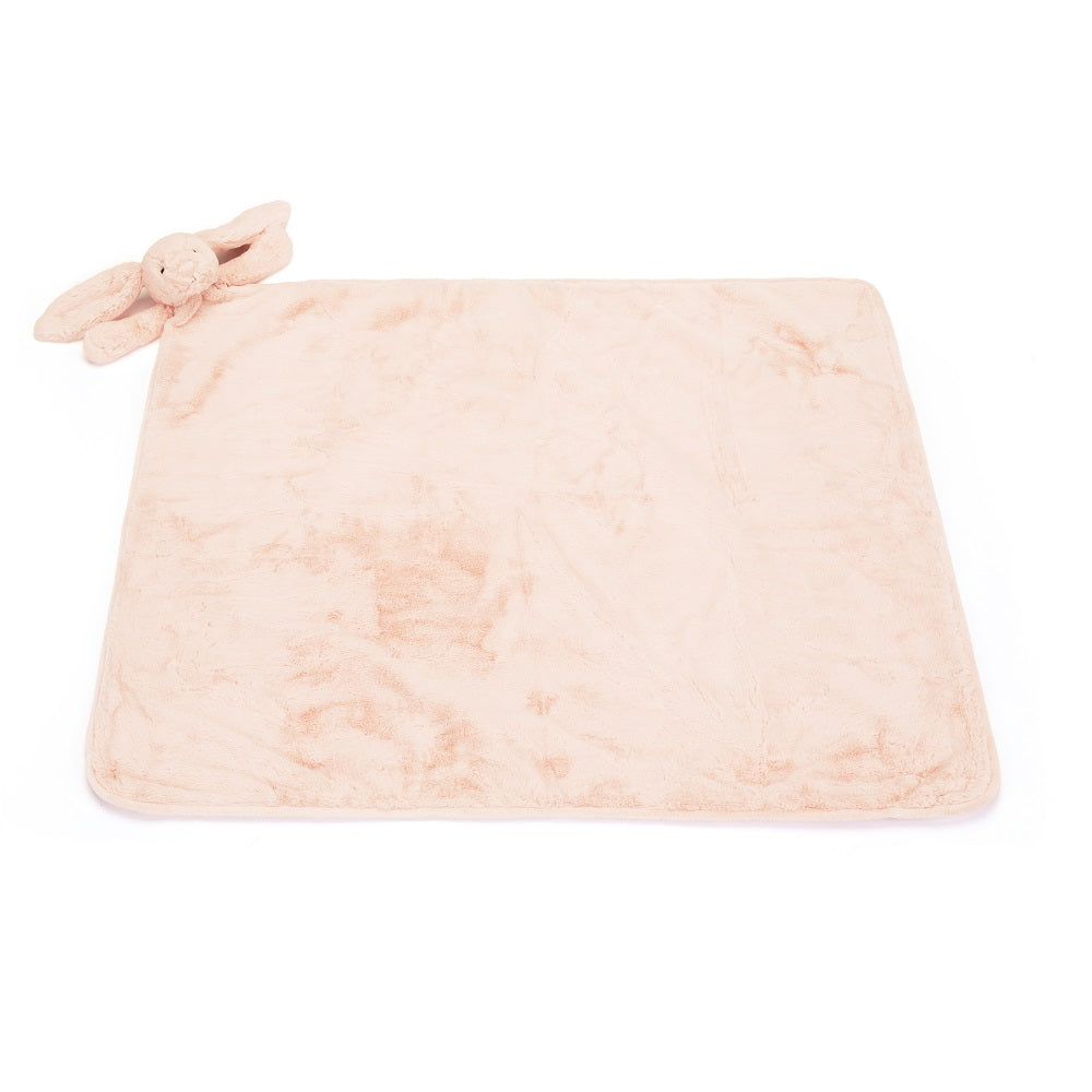 Peach bunny lovey on a peach faux fur baby blanket.
