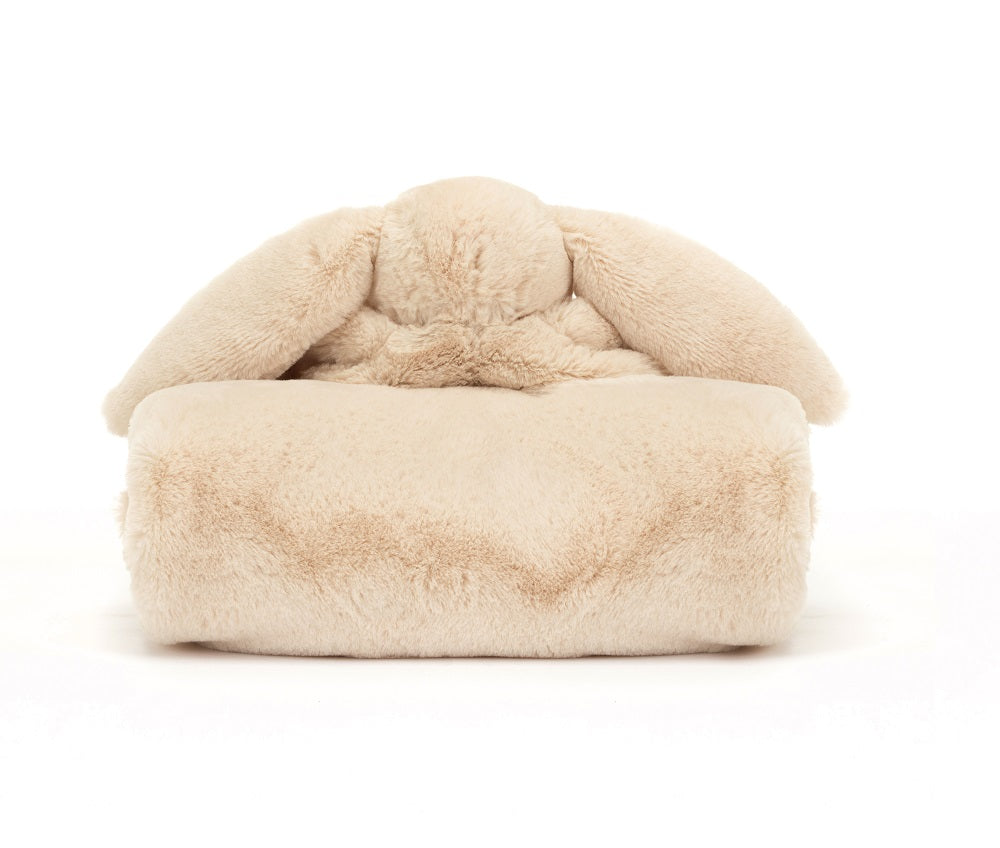 Tan plush bunny cushion.