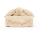 Tan plush bunny blanket.