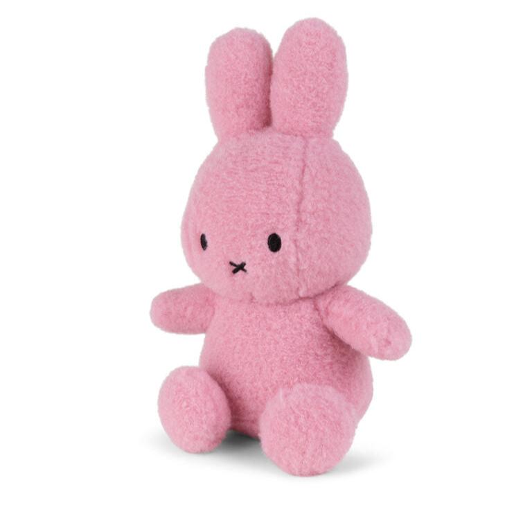 Pink Miffy plush toy sitting upright.