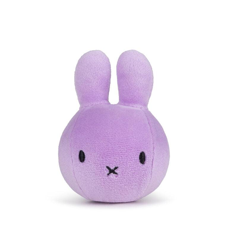 A purple plush toy rabbit with an X for a mouth.