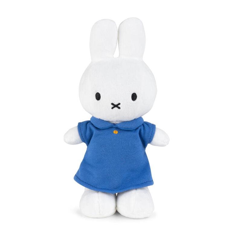 White Miffy plush toy with a blue dress.