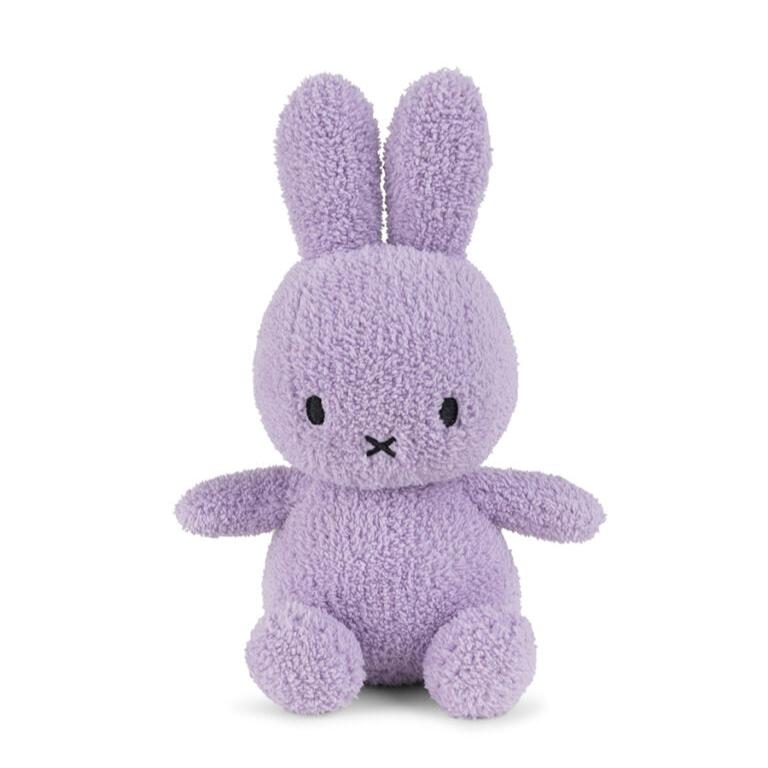 Lavender plush bunny toy sitting upright.