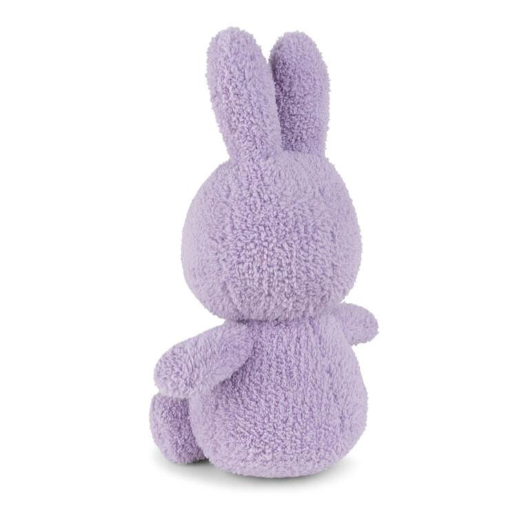 Rear view of a lavender plush bunny.