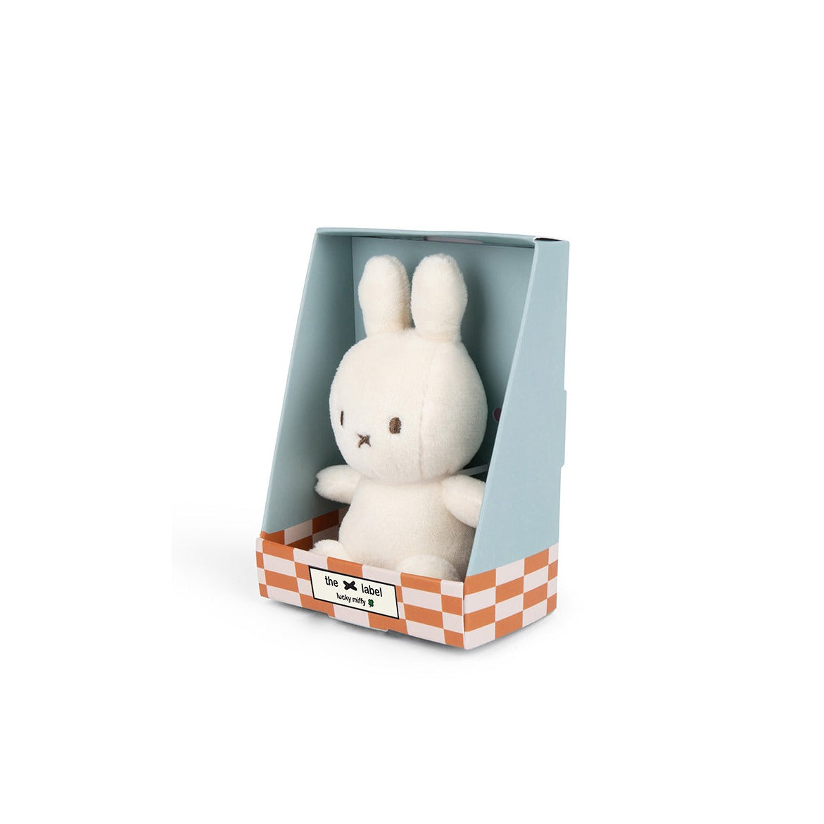 Stuffed Miffy toy in checkered box.