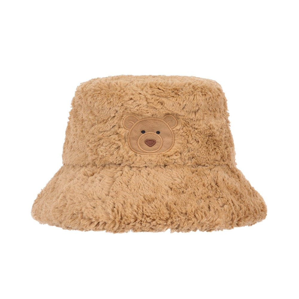 A light brown fuzzy bucket hat with an embroidered teddy bear face on the front, set against a plain white background.