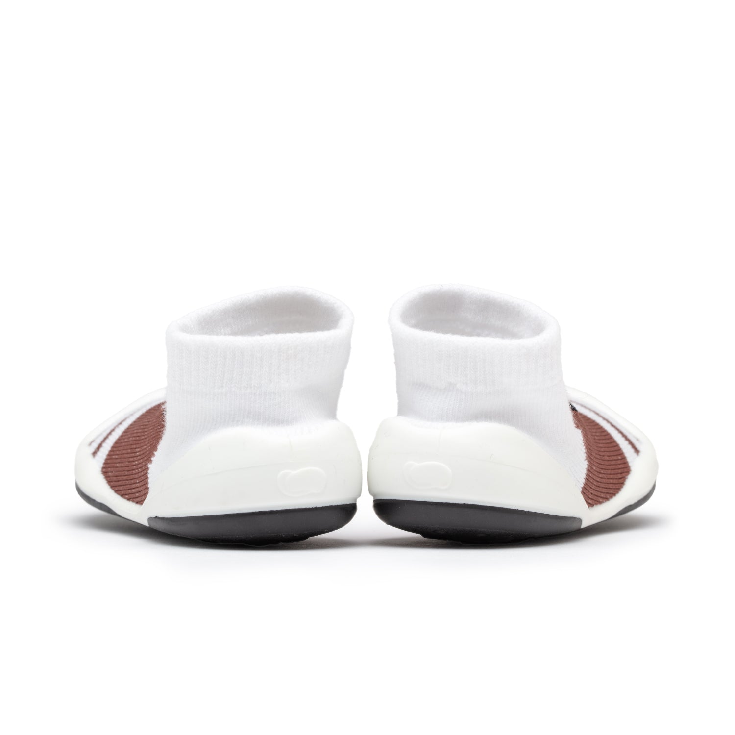Two white and brown baby sock shoes.