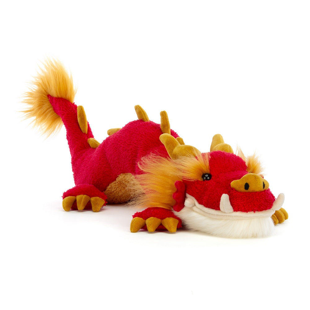 Red and gold plush dragon toy.