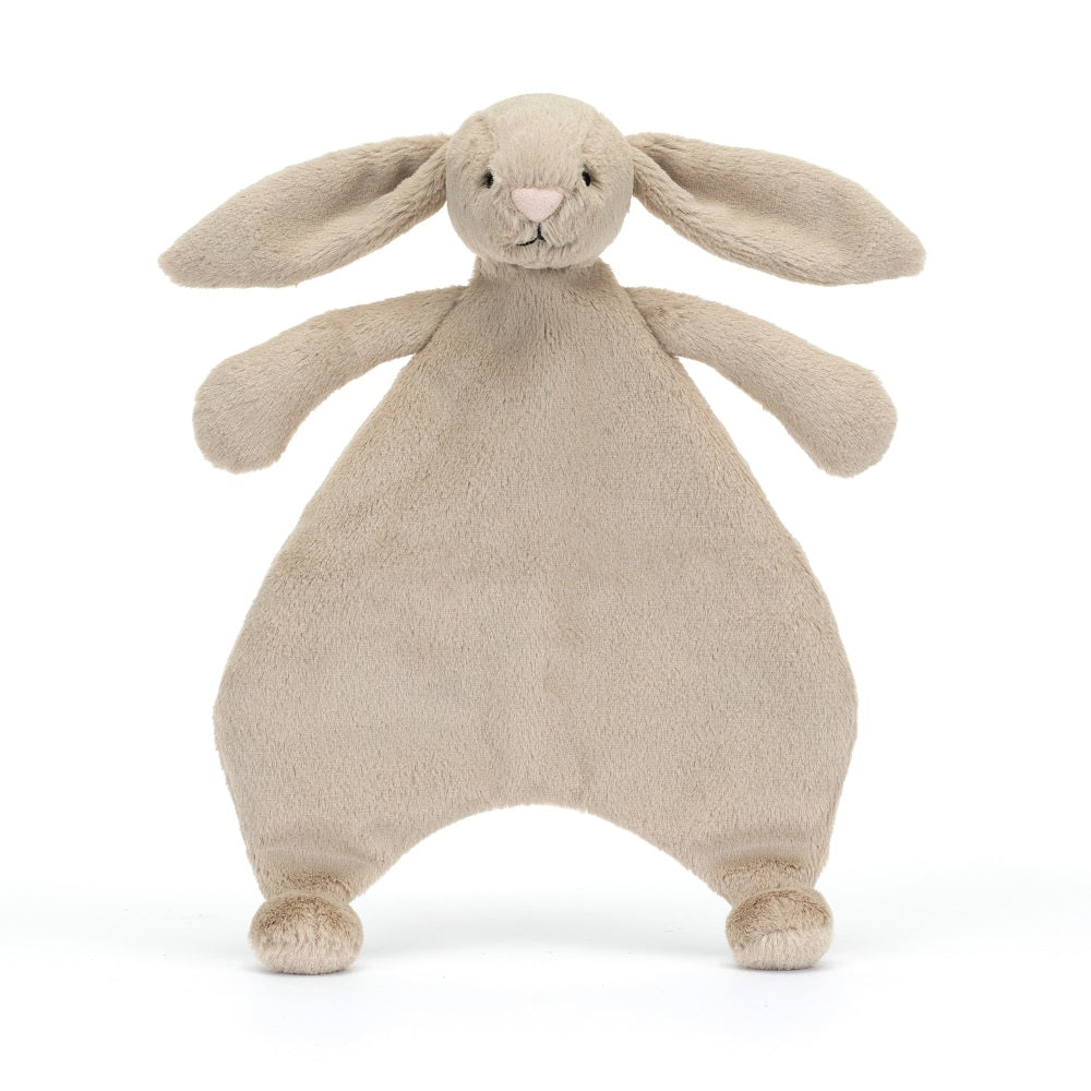 Beige stuffed rabbit with long ears.