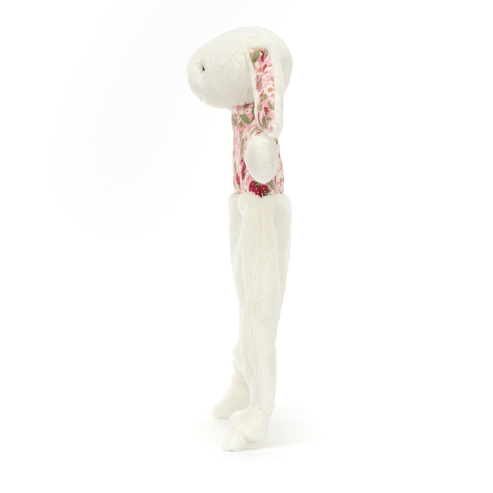 Cream bunny plush toy with floral torso and ears.