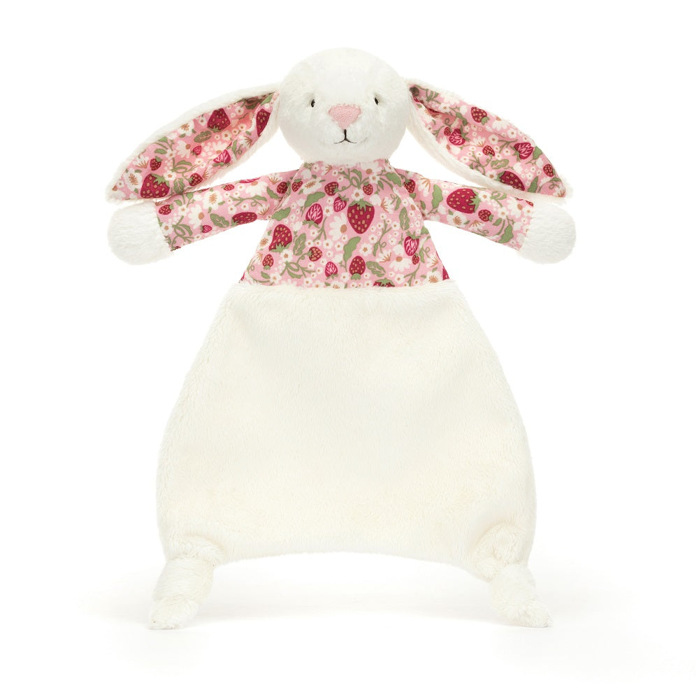 White plush bunny with strawberry-patterned ears and dress.