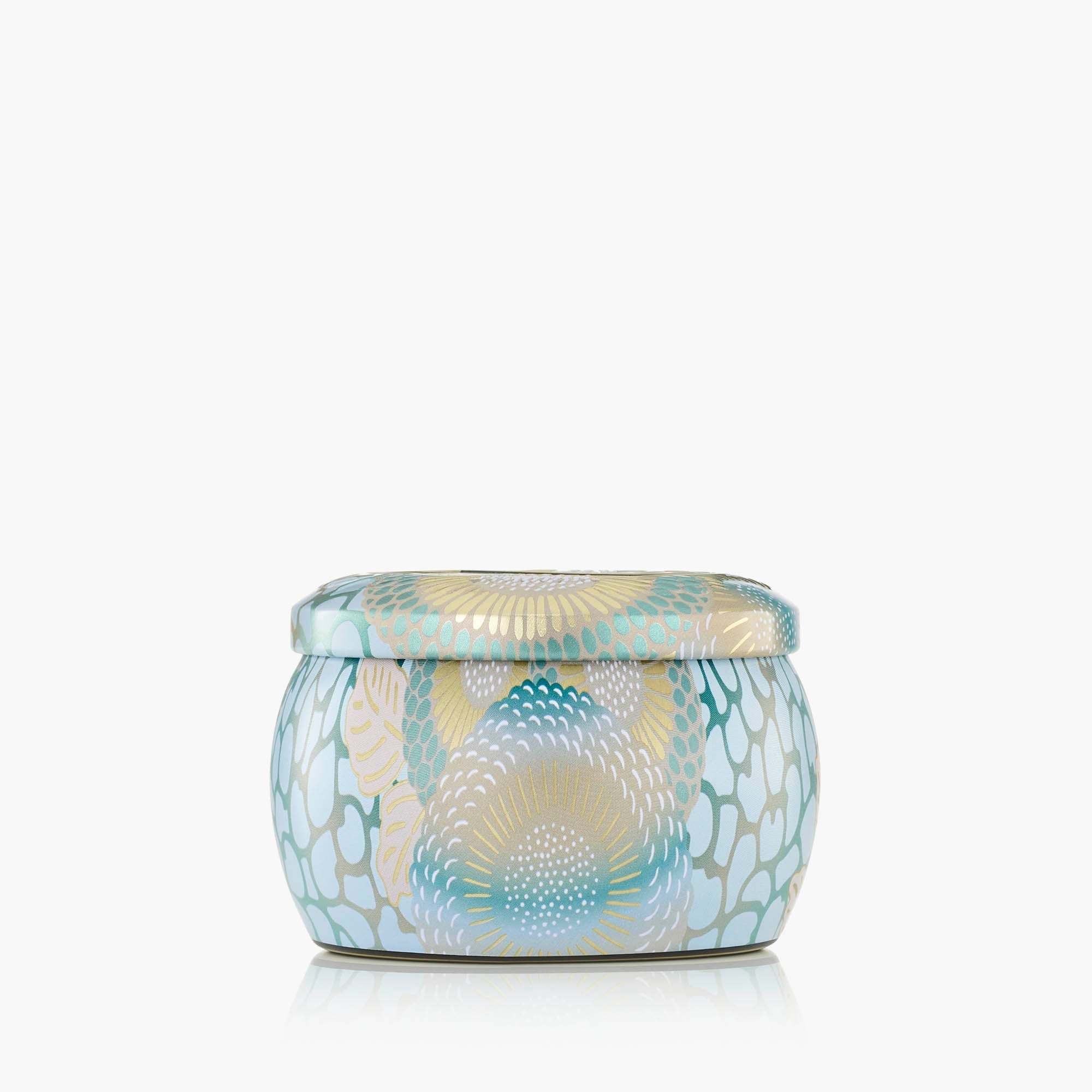 Decorative jar with a patterned lid on a white background