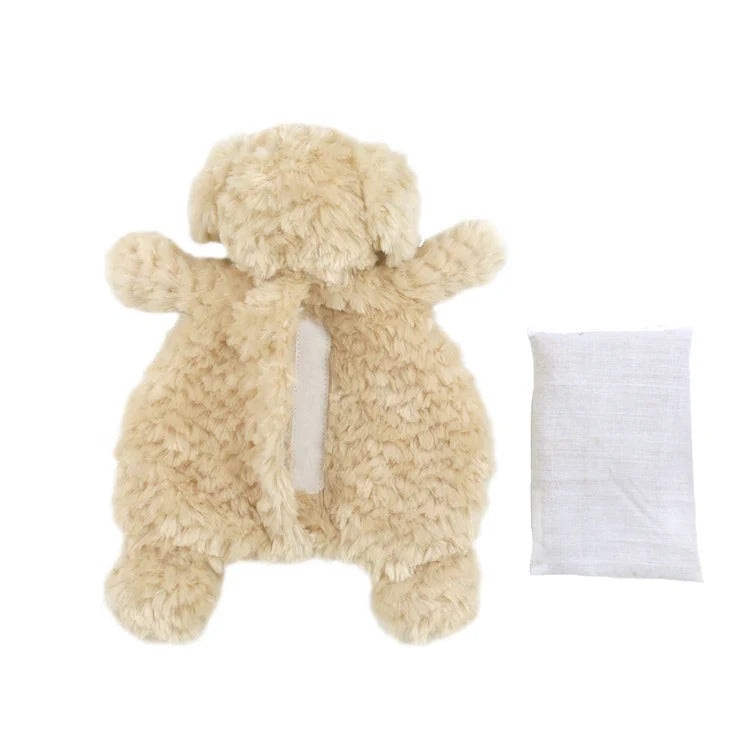 Light brown fluffy dog plush toy with a white rectangular cloth bag.