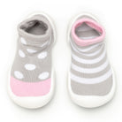 Two baby shoe-socks; gray, pink, and white.