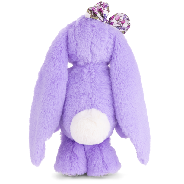 Purple plush toy with a bow on a white background