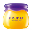 A yellow Frudia product jar with a purple lid.