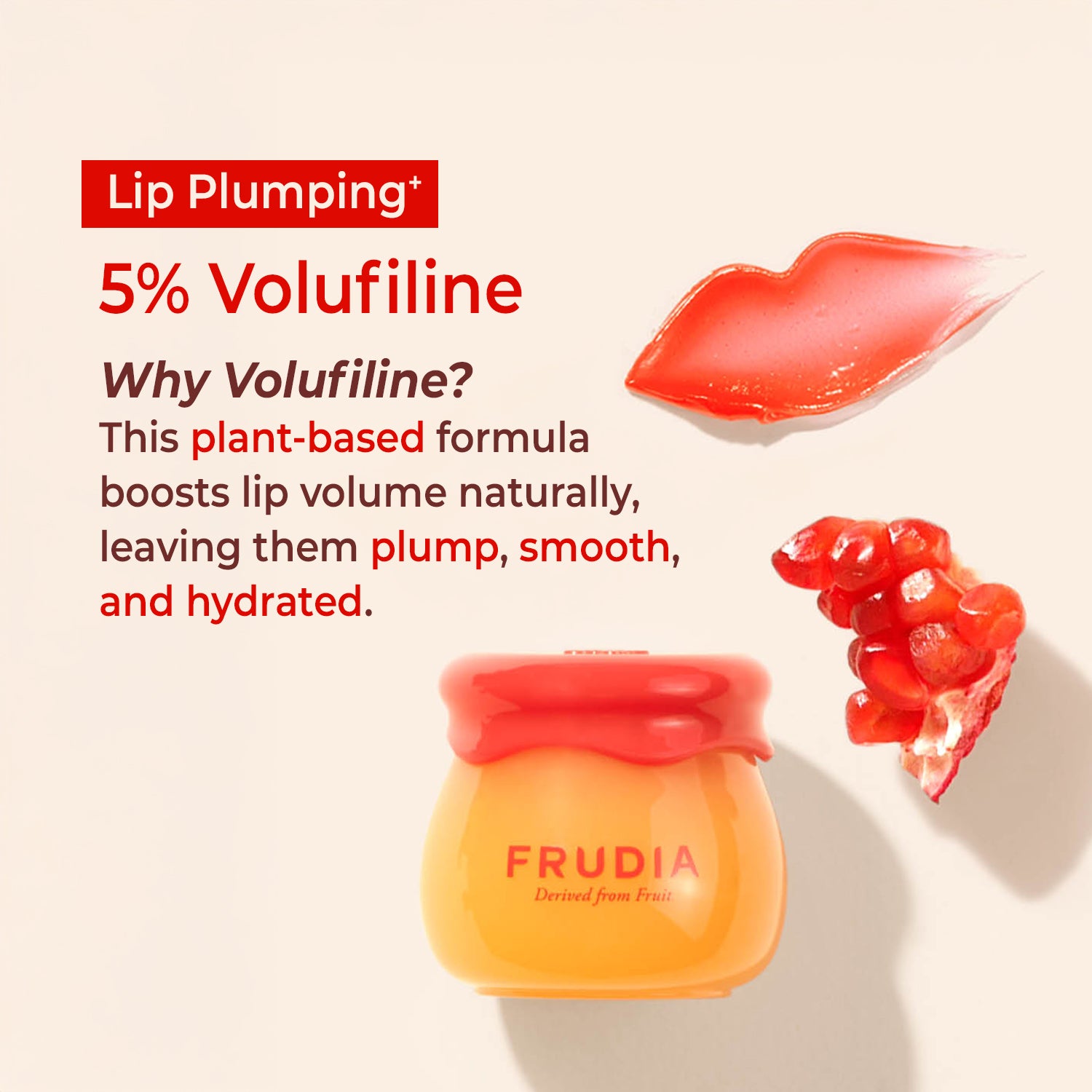 A product shot for a "Lip Plumping" lip balm, featuring the orange and red jar of the Frudia lip balm, a pomegranate, and a swipe of lip gloss.