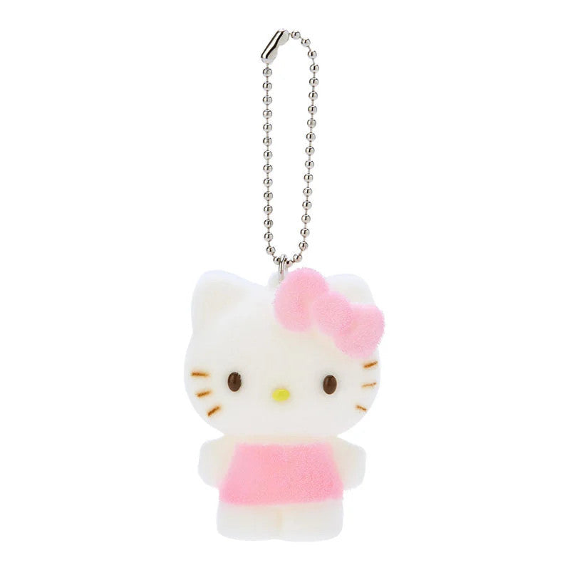 White, plush Hello Kitty keychain with a pink bow and dress.