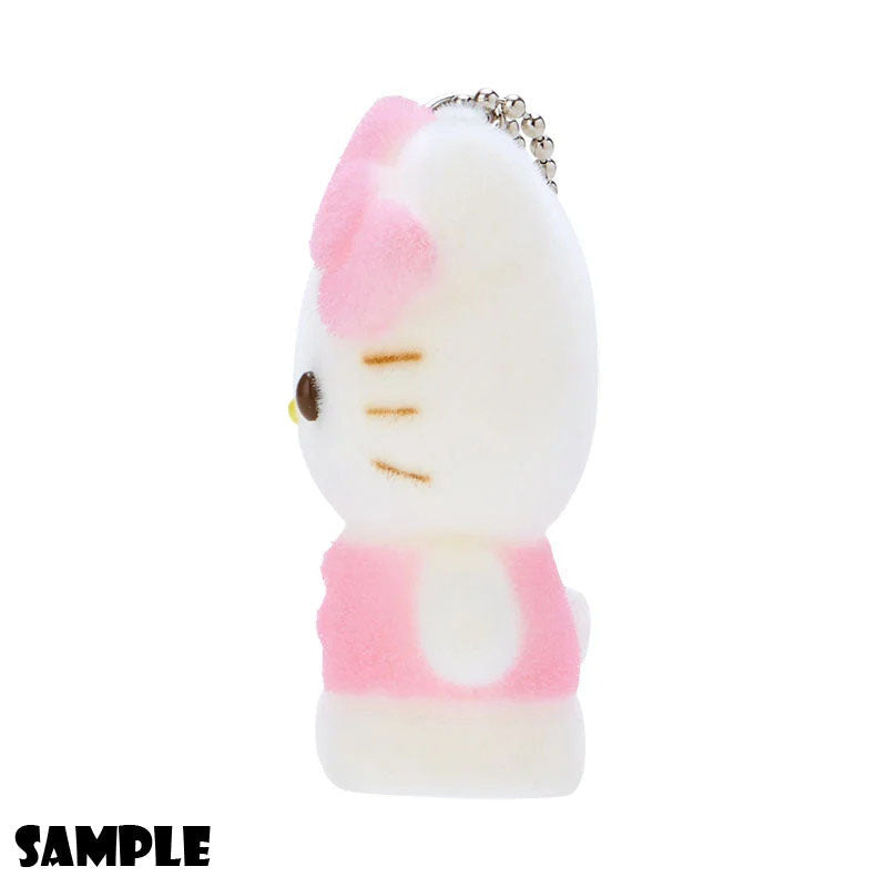 Profile view of a Hello Kitty plush keychain.