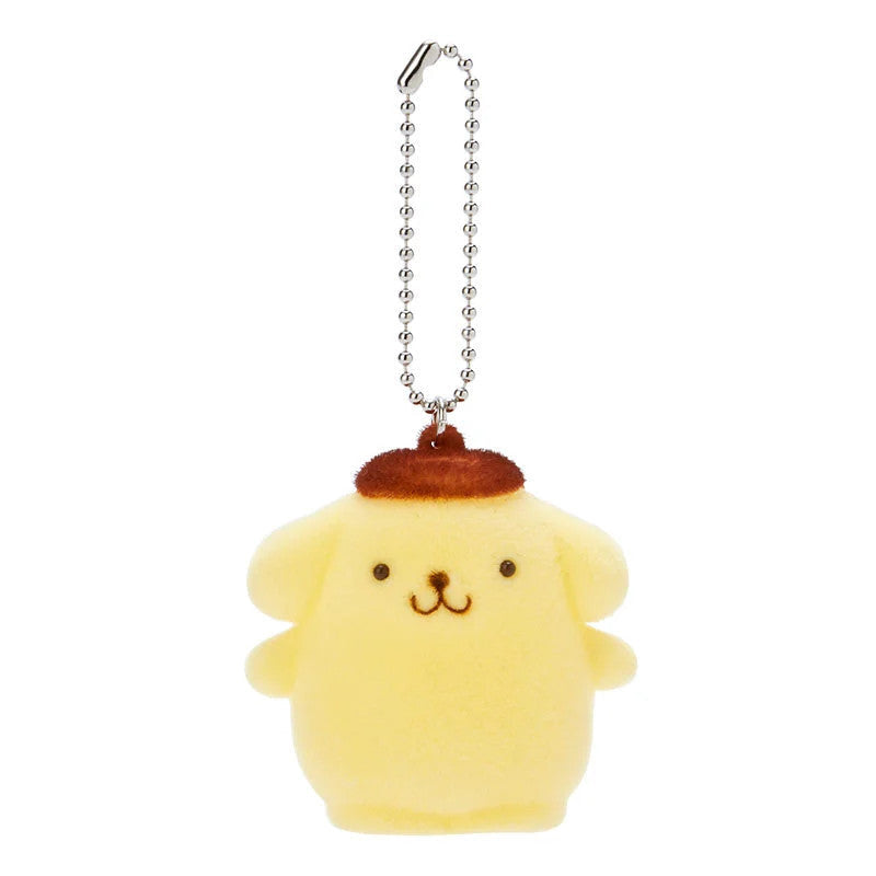Yellow Pompompurin plush keychain with a brown hat and silver chain.