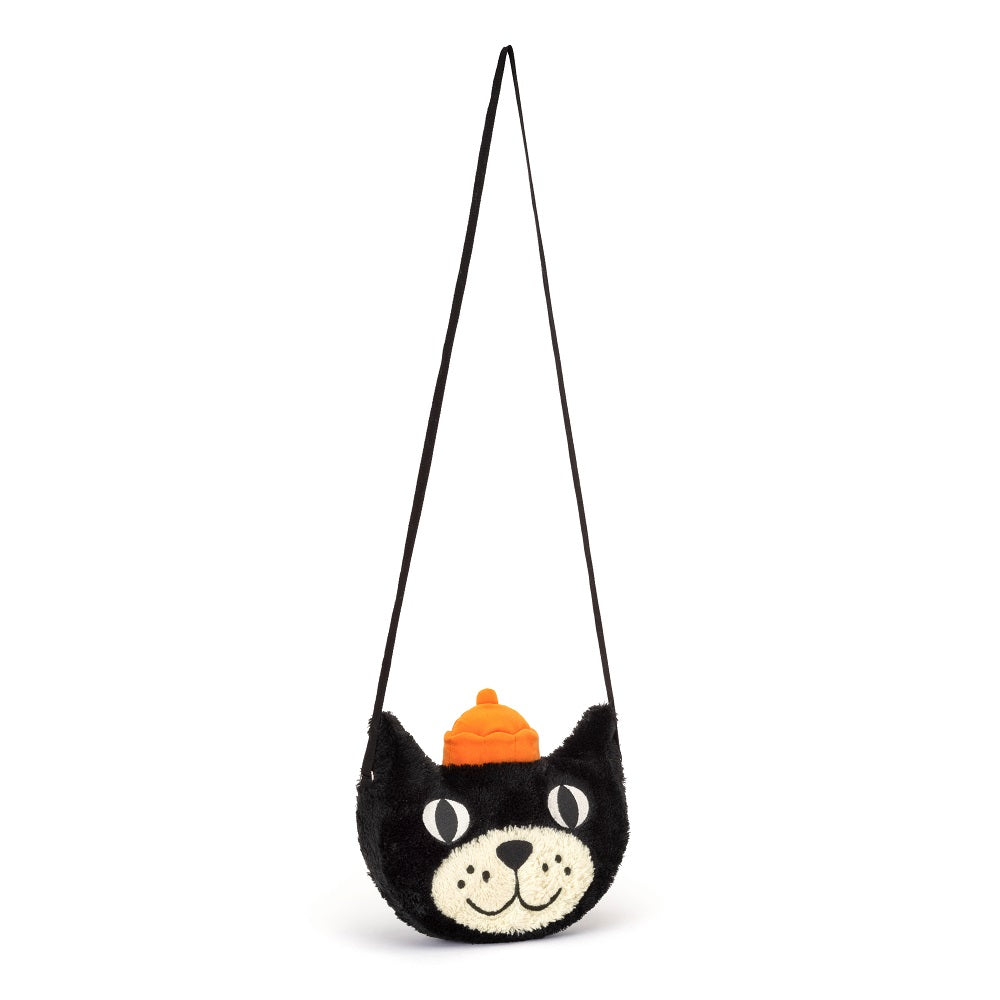 Black cat plush purse with orange hat.