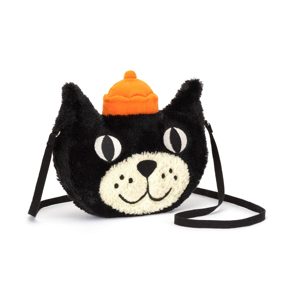 Black cat-shaped fuzzy purse with an orange hat and black strap.