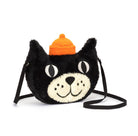 Black cat-shaped fuzzy purse with an orange hat and black strap.