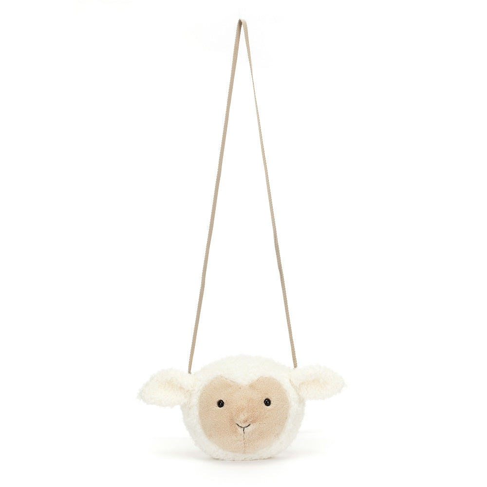 Stuffed lamb crossbody bag with beige strap.