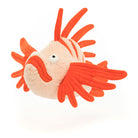 Stuffed orange lionfish on white background.