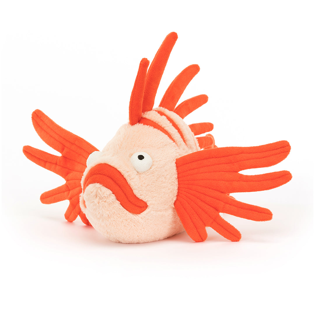 Orange and cream plush fish with spiky fins.